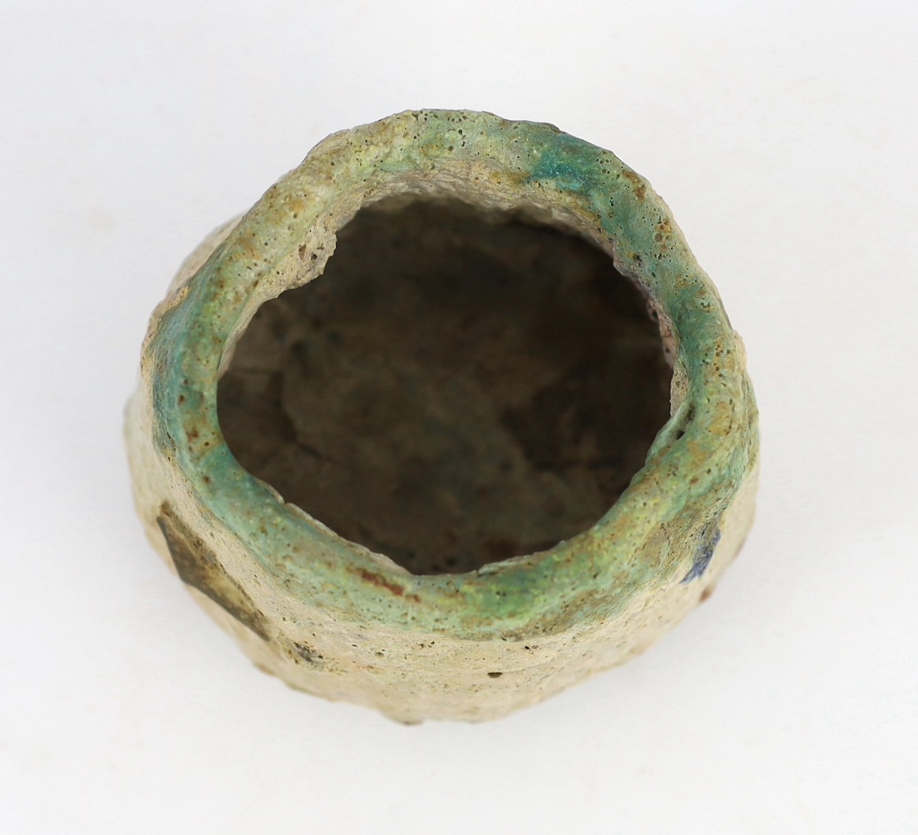 Ewen Henderson (1934-2000), a hand-built mixed laminated clay unomi, 11cm across 8.5cm high